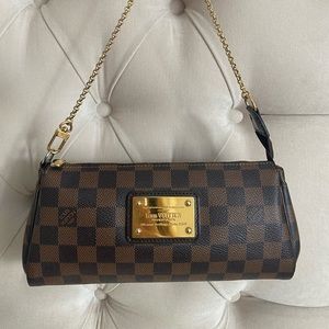 Louis Vuitton- eva clutch